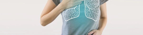 Detail of person's chest with illustration of lungs overlaid to demonstrate breath.